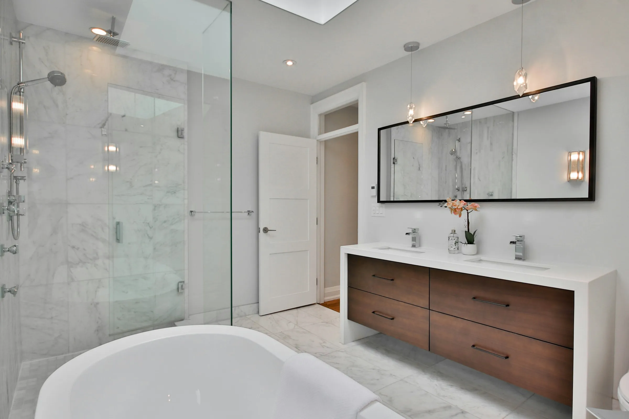 Modern bathroom mirror installation with clean wall-mounted design